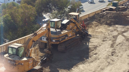 Caterpillar excavator at construction site, August 16, 2015