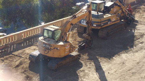 Caterpillar excavator at construction site, August 16, 2015