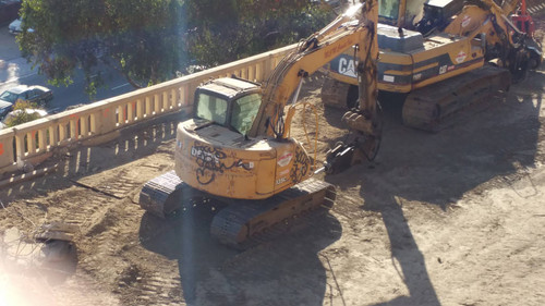 Caterpillar excavator at construction site, August 16, 2015