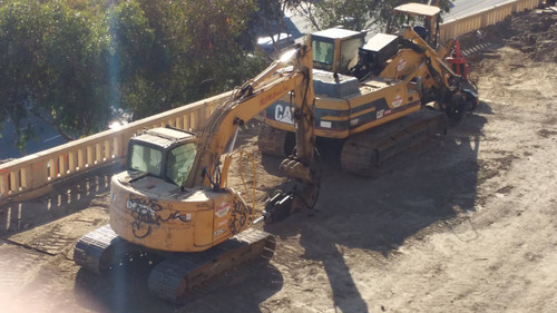 Caterpillar excavator at construction site, August 16, 2015