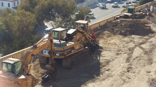 Caterpillar excavator at construction site, August 16, 2015