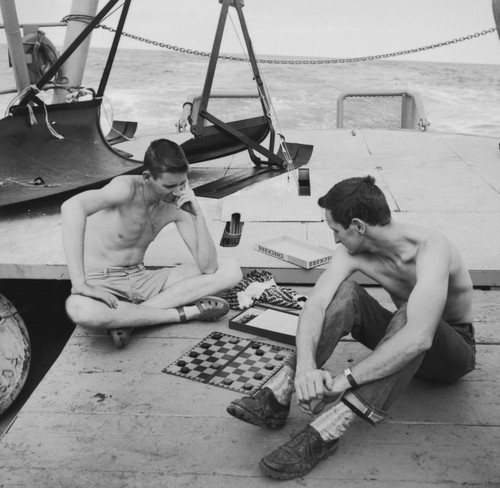 Winter Davis Horton and Miles M. Payne play checkers, R/V Horizon