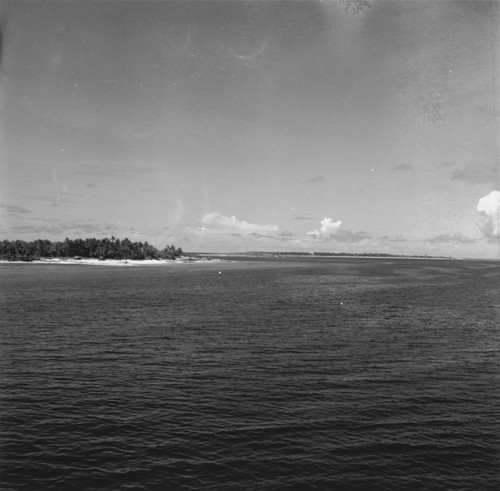 Landing craft on beach during the Capricorn Expedition, Bikini Atoll area