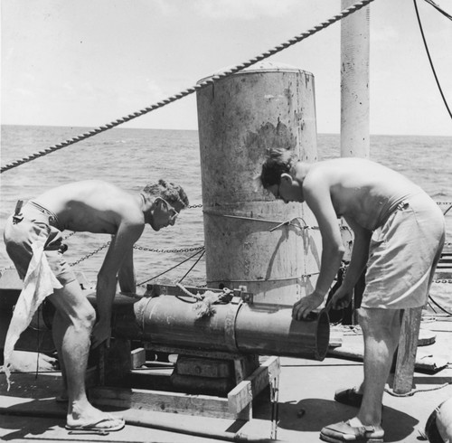 Richard Blumberg and Ronald G. Mason with a magnetometer