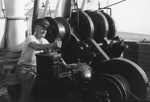 Harold W. Brown "Brownie" operates small winch on R/V Spencer F. Baird