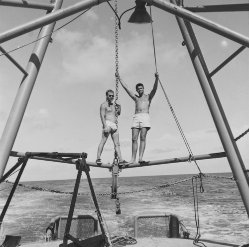 Two crew members, Bernard Darsey (?) and Edward Sheldon Barr, aboard R/V Horizon