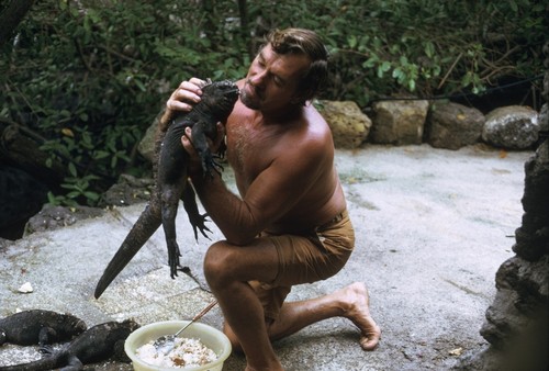 Karl Angermeyer with one of his tame land iguanas, Puerto Ayora, Academy Bay, Santa Cruz Island, Galápagos