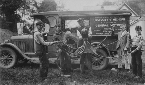 Carl Hubbs, as curator of fishes at the University of Michigan Zoological Museum, with octopus specimen