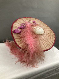 Pink hat with feather