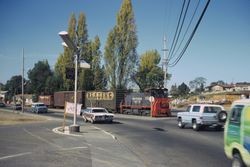 Southern Pacific train on South Main Street at Petaluma Ave., Sebastopol, Oct. 1975