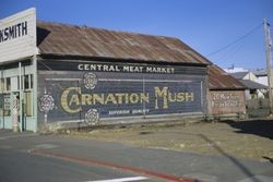 Central Meat Market and Carnation Mush sign on old store siding in Sebastopol, Mar. 1972