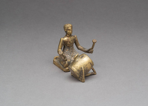 Figurine Playing Skor Arak (Spirit Drum), #1