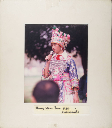 White HMong Girl Singing at HMong New Year Celebration in Sacramento, California