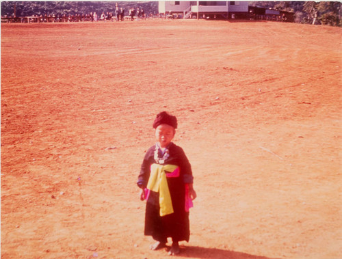 White HMong Child Standing Outdoors in Xieng Khouang Province