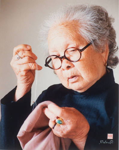 Elderly Woman Sewing