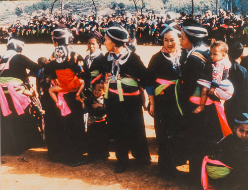 White HMong Women and Children Celebrating New Year Outdoors in Laos