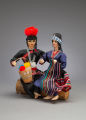 HMong Couple Sitting on Log