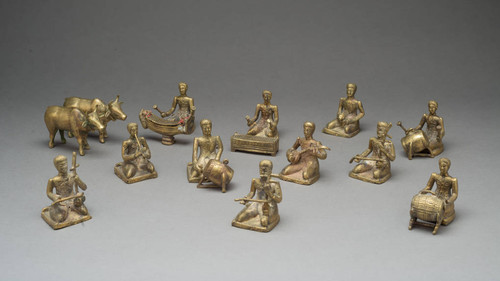 Collection of Figurines Playing Instruments, #1 — Calisphere