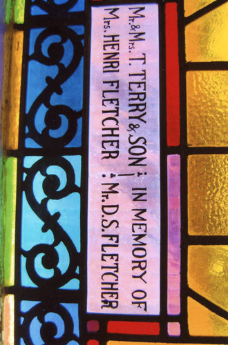 Stained glass window at Phillips Chapel Christian Methodist Episcopal Church, inscribed to honor the Terry and Fletcher families