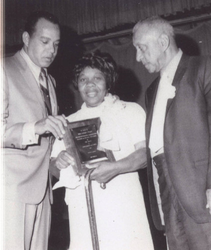 Thelma Terry receiving an award for community service