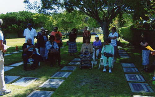 Mentees of Thelma Terry gathered at Woodlawn Cemetery for Terry's gravesite marker unveiling
