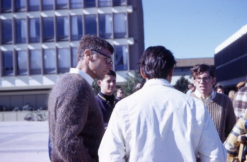 Paul Saltman, Provost of Revelle College, talking with students on Revelle Plaza