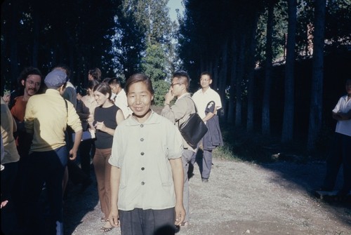 Woman in plain blouse