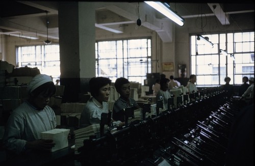 Printing House workers, binding books