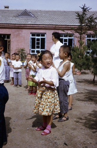 Daycare center visit, children singing