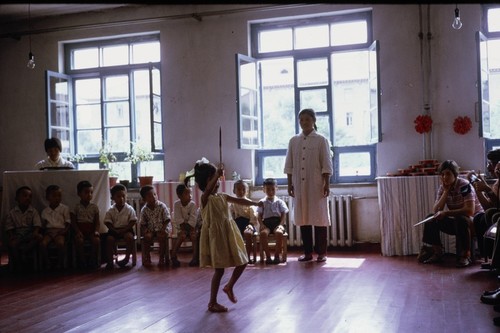 Daycare center visit, girl dancing