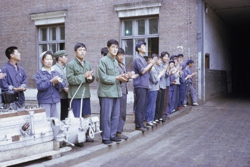 Factory workers welcoming American visitors (5 of 5)