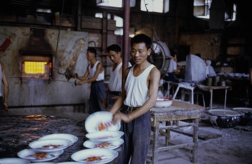 Enamel factory kiln room workers