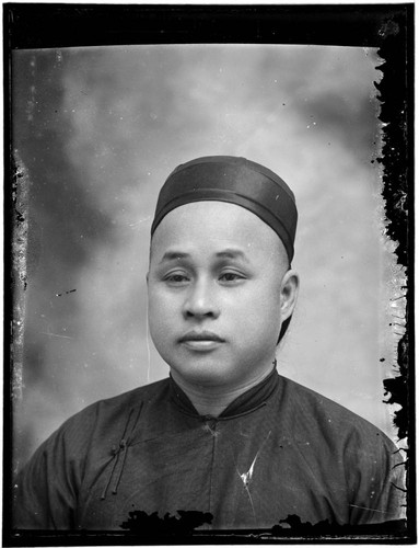 Head-shot portrait of a Chinese man