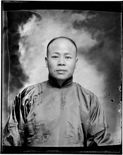 Head-shot portrait of a Chinese man