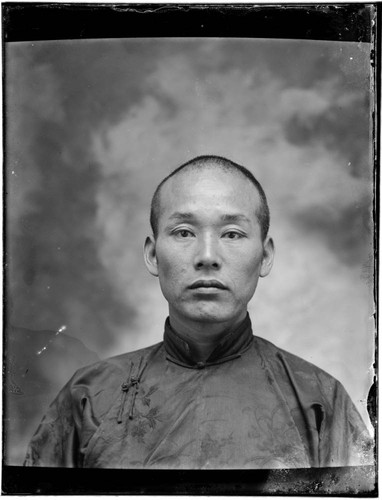 Head-shot portrait of a Chinese man