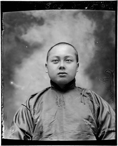 Head-shot portrait of a Chinese man