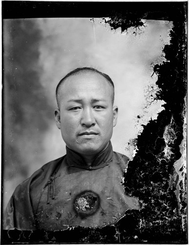 Head-shot portrait of a Chinese man