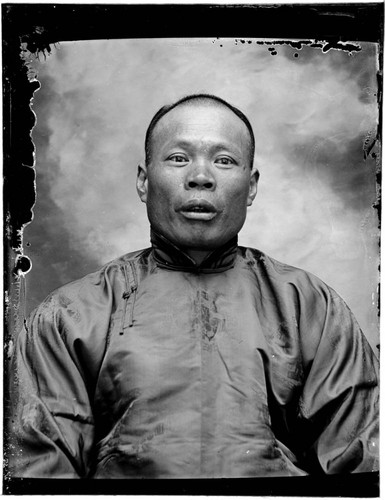 Head-shot portrait of a Chinese man