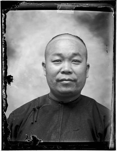 Head-shot portrait of a Chinese man