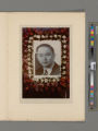 Photograph of the portrait of Peter SooHoo surrounded by flowers used in his funeral