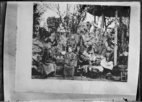 Copy photograph of men posed as the Eight Immortals from Chinese mythology