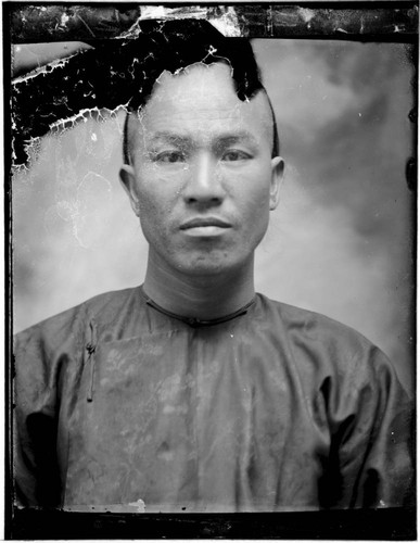 Head-shot portrait of a Chinese man