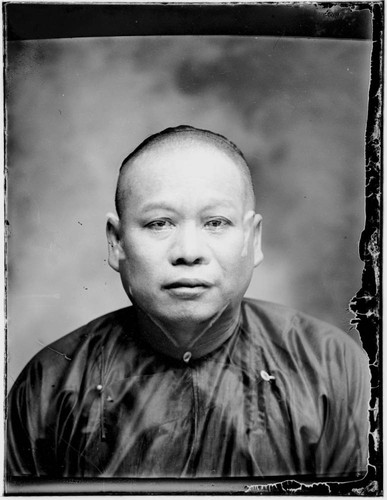 Head-shot portrait of a Chinese man