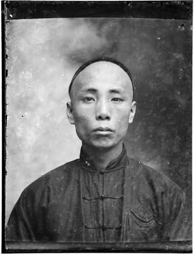 Head-shot portrait of a Chinese man