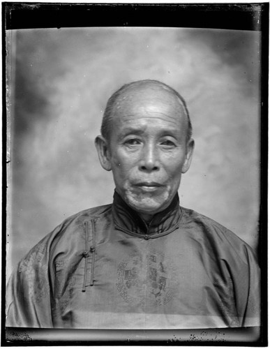 Head-shot portrait of a Chinese man