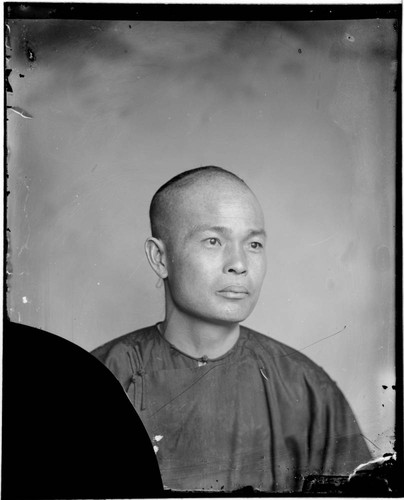 Head-shot portrait of a Chinese man