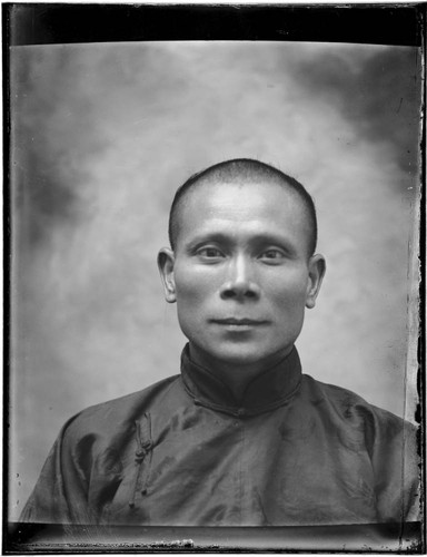 Head-shot portrait of a Chinese man
