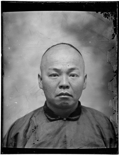 Head-shot portrait of a Chinese man