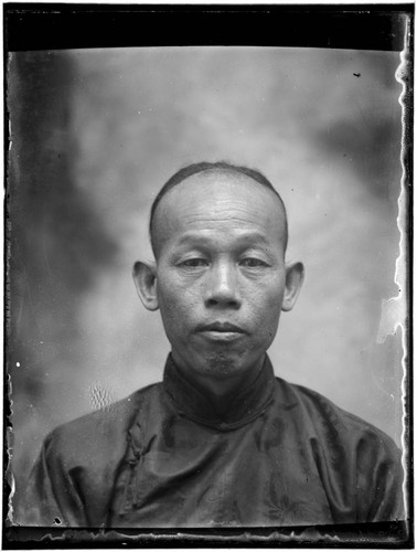 Head-shot portrait of a Chinese man