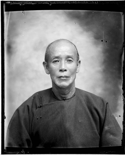 Head-shot portrait of a Chinese man